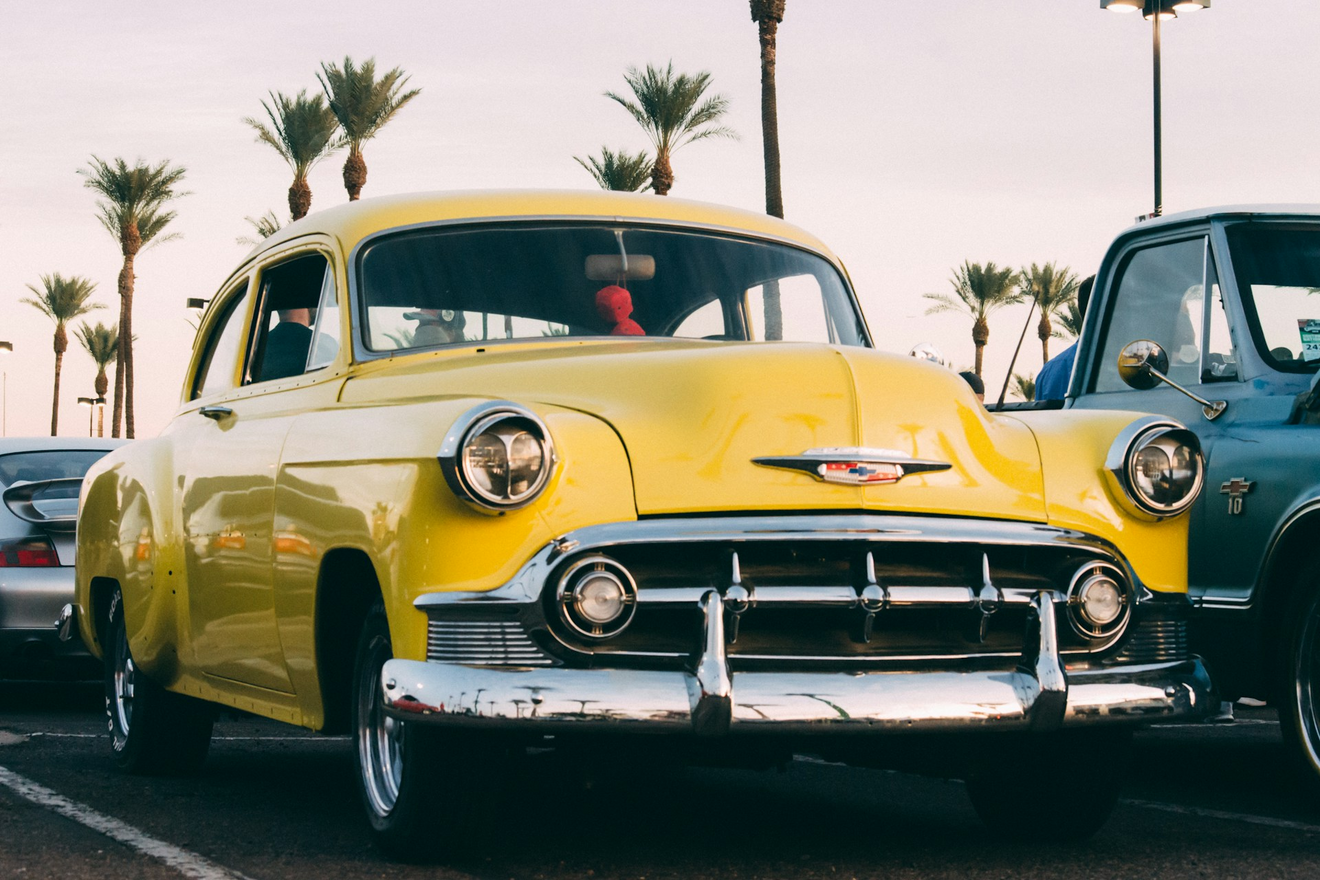 Chevrolet Bel Air. This image represents: Car, Transportation, Vehicle, Bumper, Machine, Wheel, Person